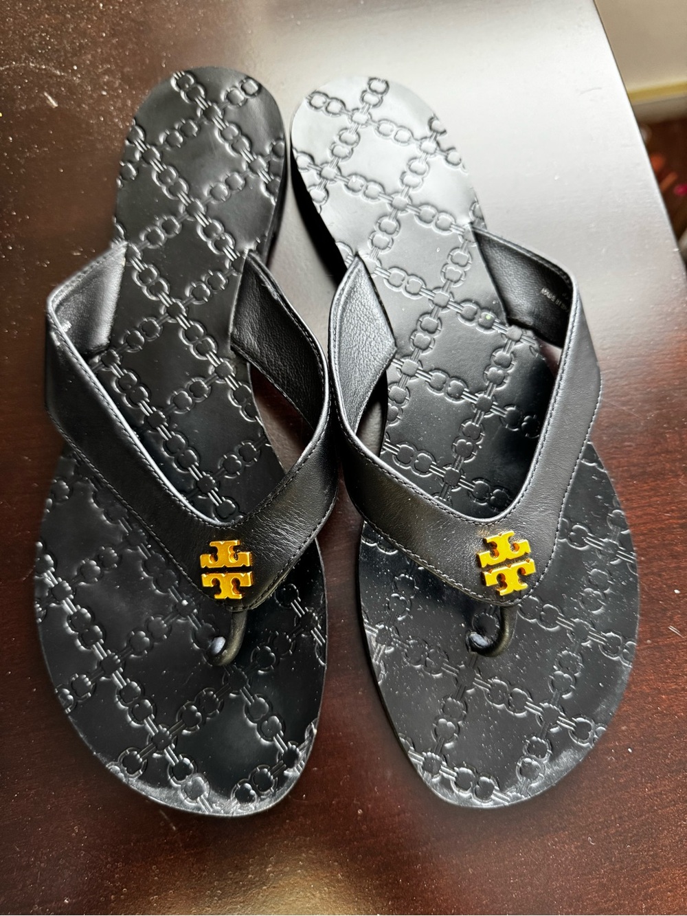 Tory Burch women’s Black Flip Flops with Gold Logo size 9